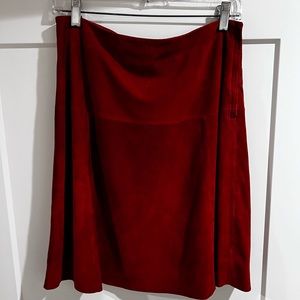 Beautiful A-line mid length 100% red leather skirt with lining.